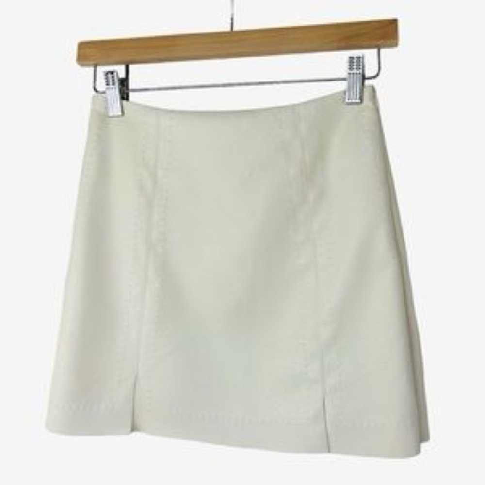 Faux white leather mini skirt